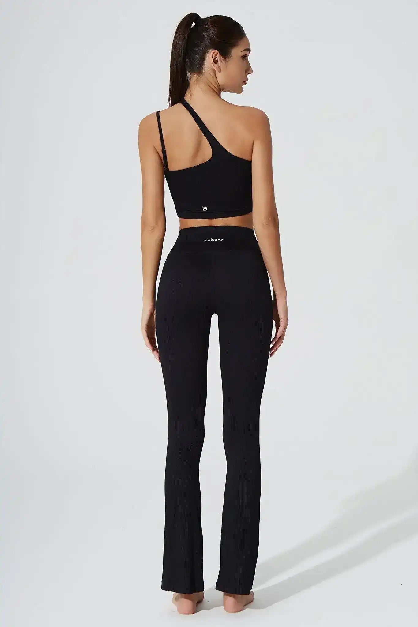 Olaben Sassy Shoulder Bra in Noir black — one-shoulder bra, lifestyle styled view