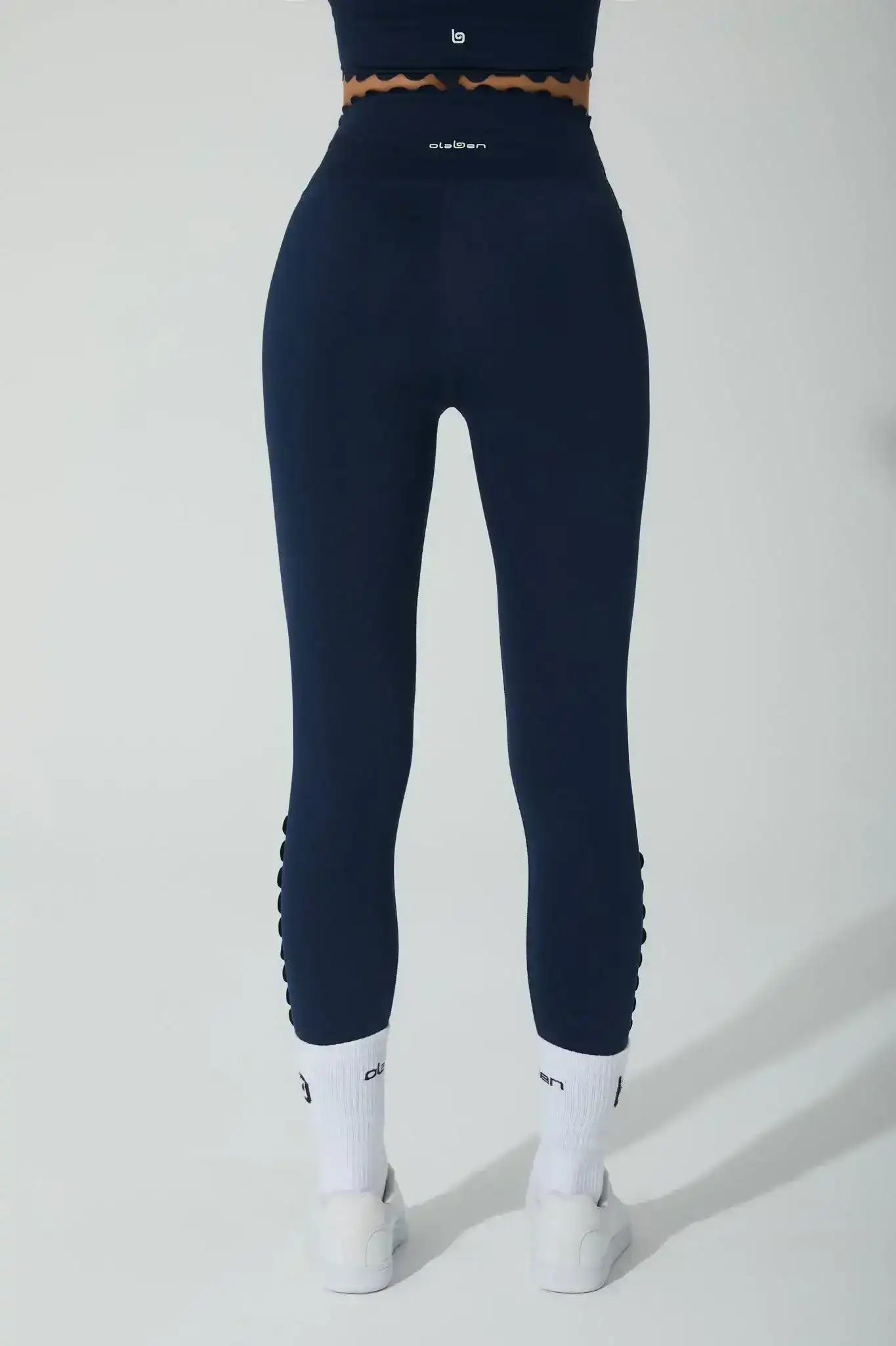 Olaben Minerva Leggings in Navy Blue — sculpting activewear, full-body styled shot