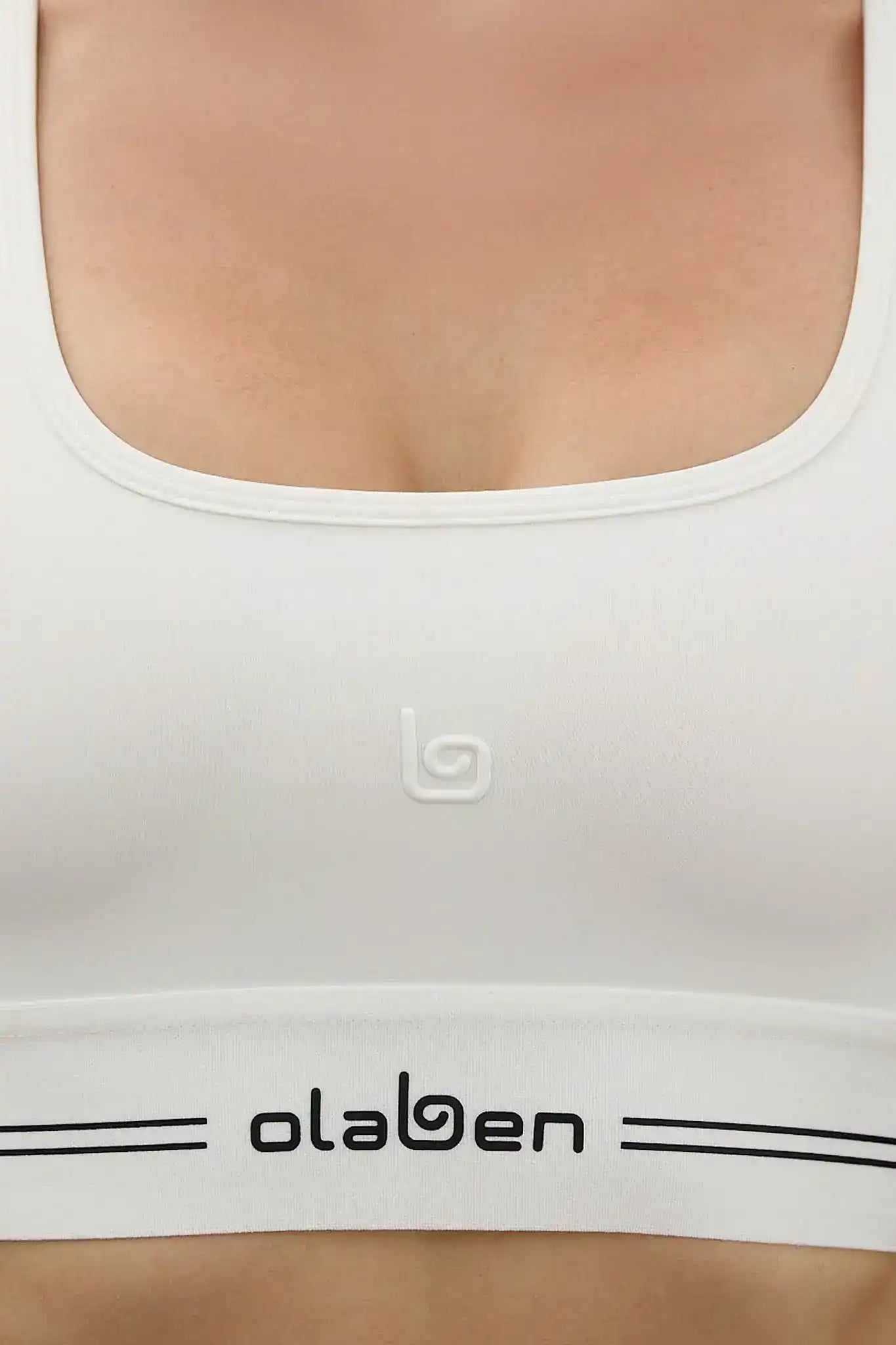 White Olaben activewear sports bra with logo detail for yoga and fitness