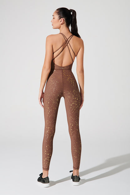 Bronze brown women's jumpsuit with a luminous glow, perfect for a stylish and trendy look.