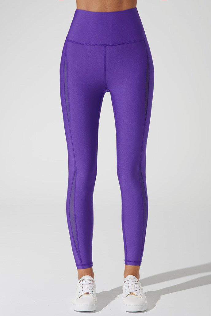 Royal purple Clarita mesh leggings for women, a stylish and comfortable choice for workouts.