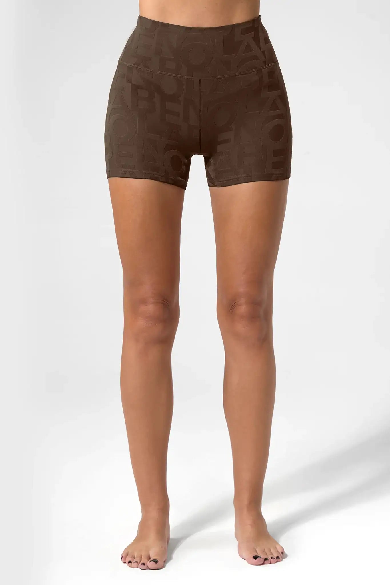 Brown high-waisted activewear shorts with patterned design for yoga and fitness