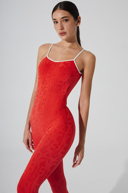 Haute red jumpsuit for women with a dazzling design.