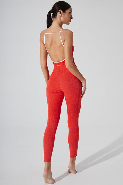 Haute red jumpsuit for women with a dazzling design.