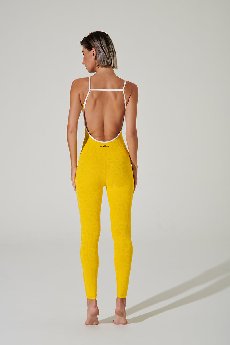 Stylish gamboge yellow jumpsuit for women with a 3D design by Coeur Del Jumpsuit.