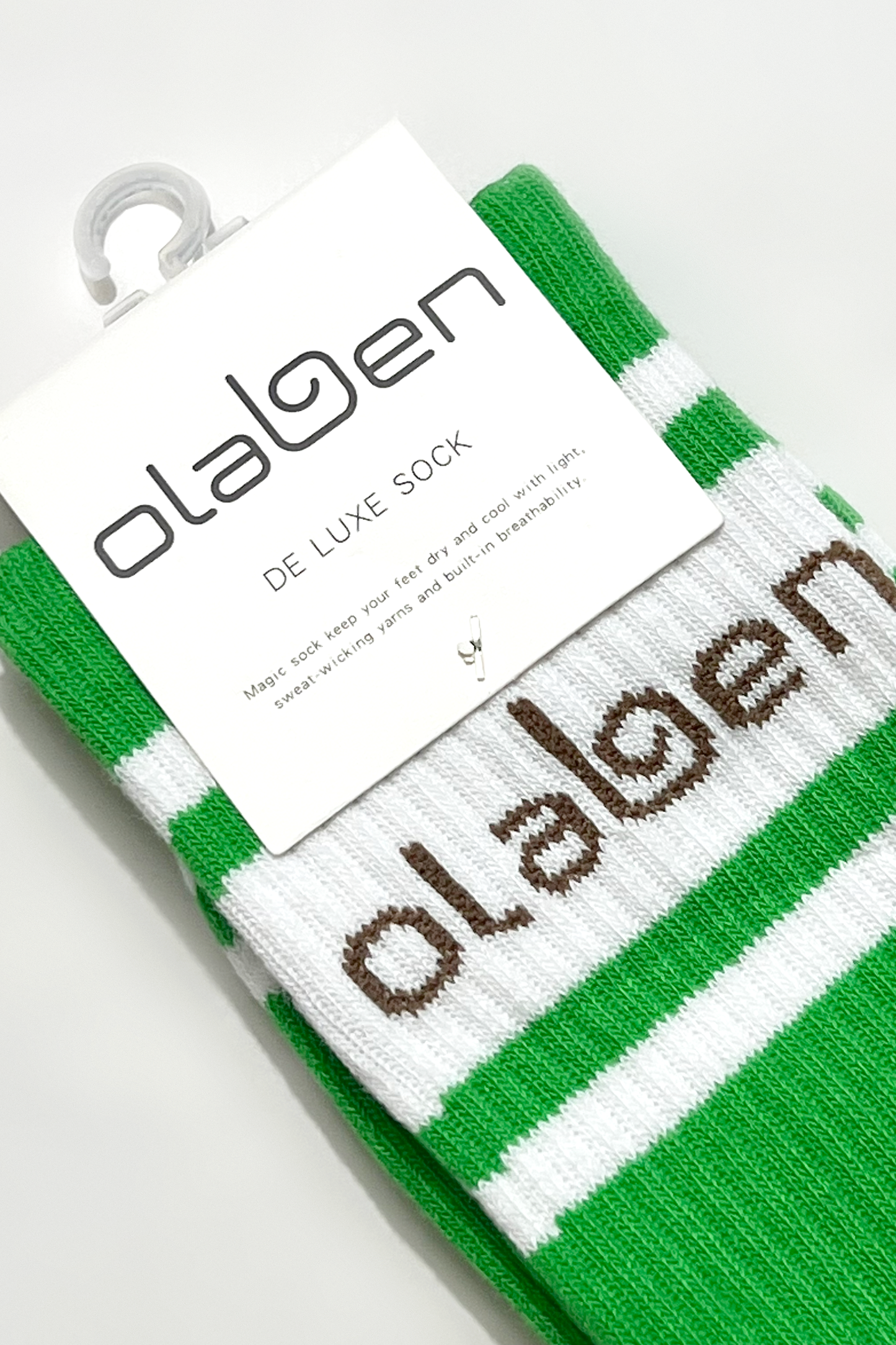 Pair of green socks with fern pattern, size 1-3, in a cozy quarter length.