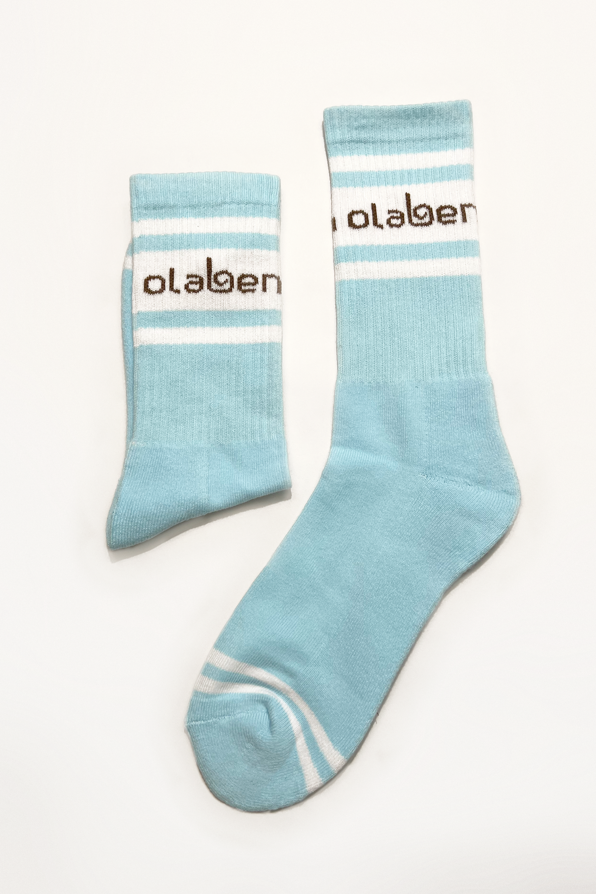 Colorful assortment of cozy quarter socks in ice blue, perfect for cloud-inspired fashion.