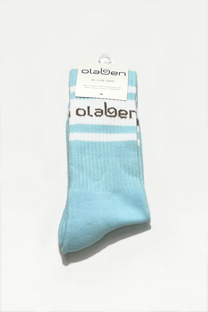 Colorful assortment of socks and ice cloud on a blue background, OW-0151-USO-BL, 4th variation.