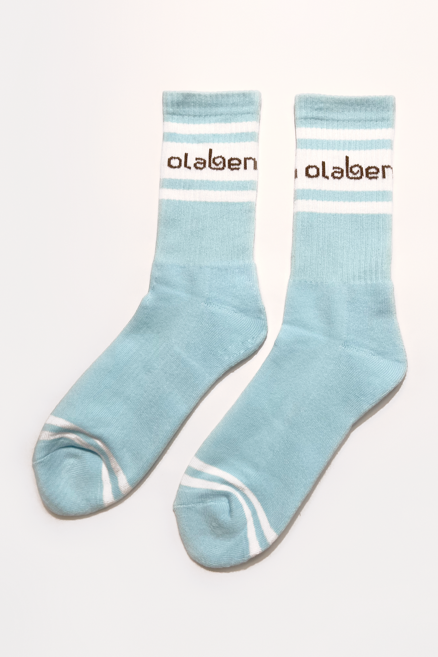 Colorful assortment of cozy quarter socks in ice blue, perfect for cloud-inspired fashion.
