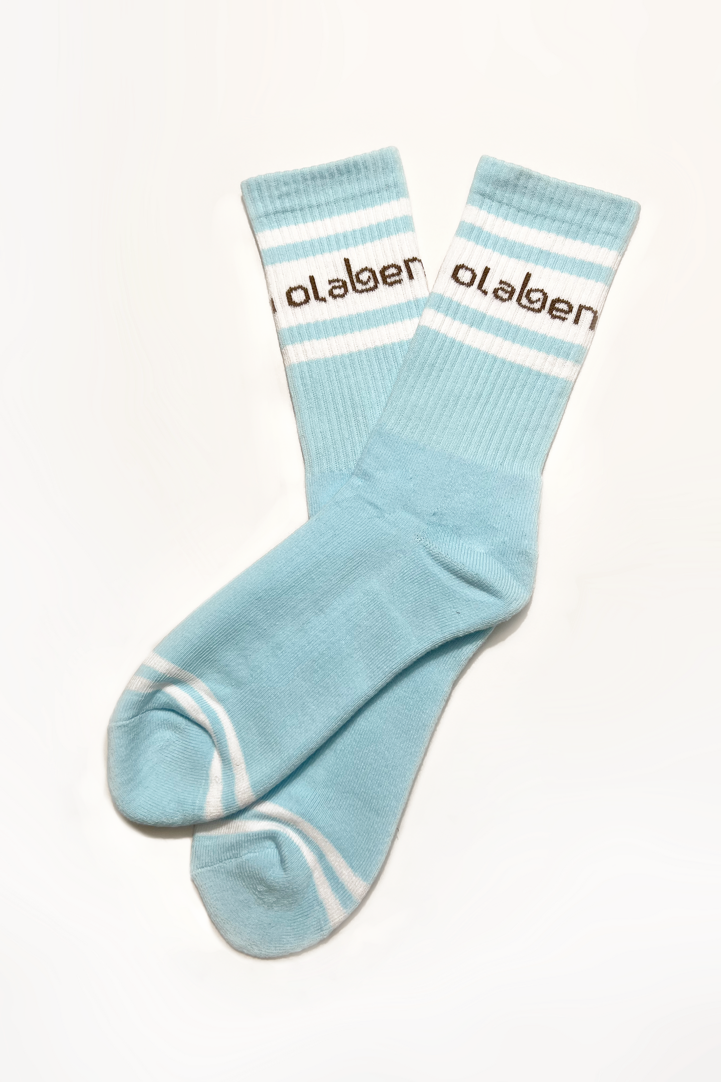 Colorful assortment of cozy quarter socks in ice blue, perfect for a stylish look.