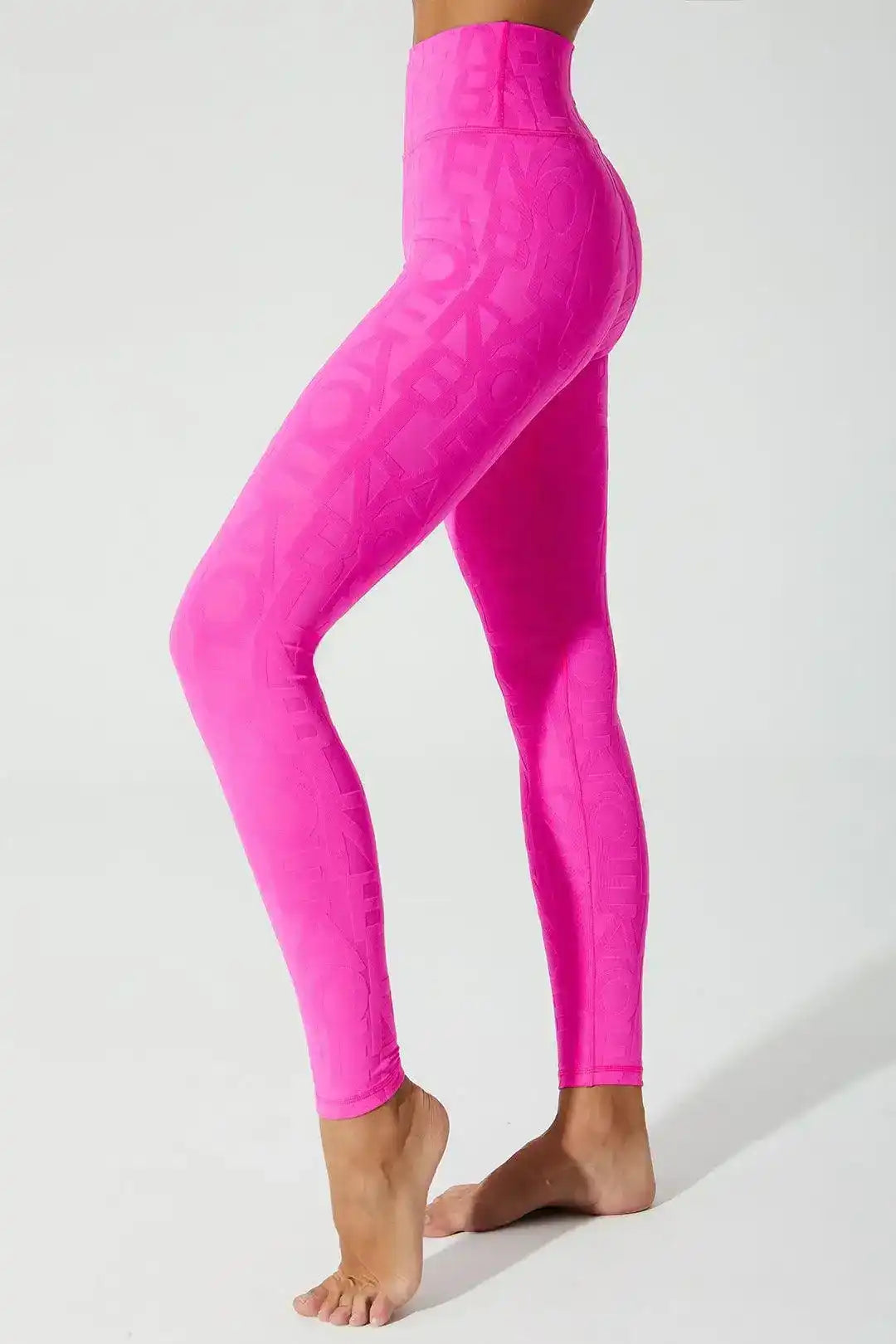 Side view of Olaben Classic Déese Fleur Legging 3D in Dark Pink Purple — 3D embossed fabric, sculpted profile, studio shot