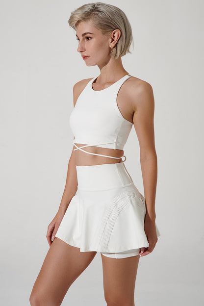 White women's skirt by Elinor, elegant and stylish fashion choice for any occasion.