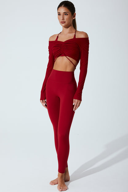 Red drawstring long sleeve women's top with a stylish and comfortable design.