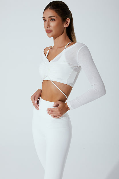 White drawstring long sleeve women's top with a stylish and comfortable design.
