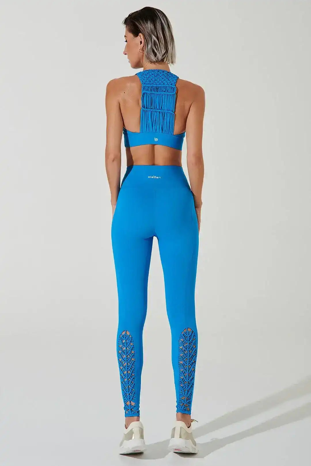 Back view of Olaben J'Aisama Sacré Bra in Sapphire Blue — sculpting strap detail, studio shot