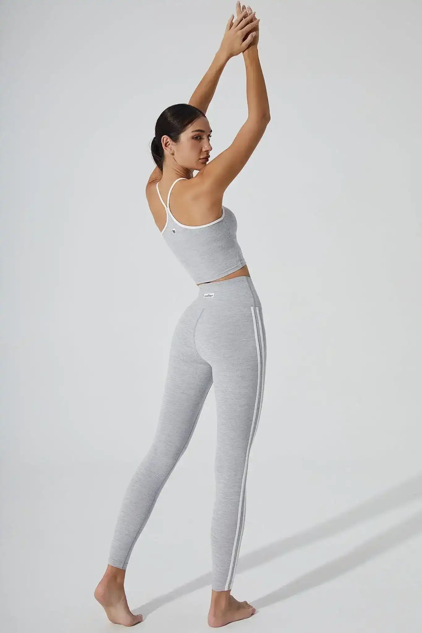 Back view of Olaben Kennedy Align Legging in Pebble gray — sculpting fit, studio shot