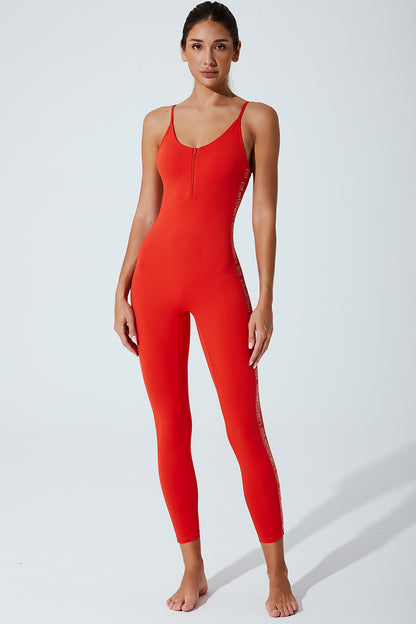 Stylish women's red jumpsuit with a Venetian touch, perfect for a fashionable statement.