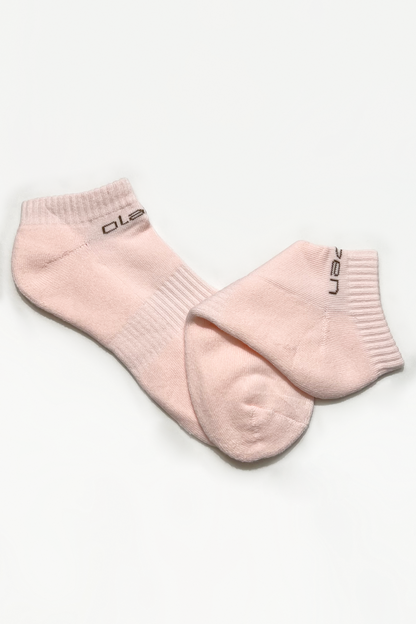 Colorful short socks with seashell design in pink, perfect for a stylish and playful look.
