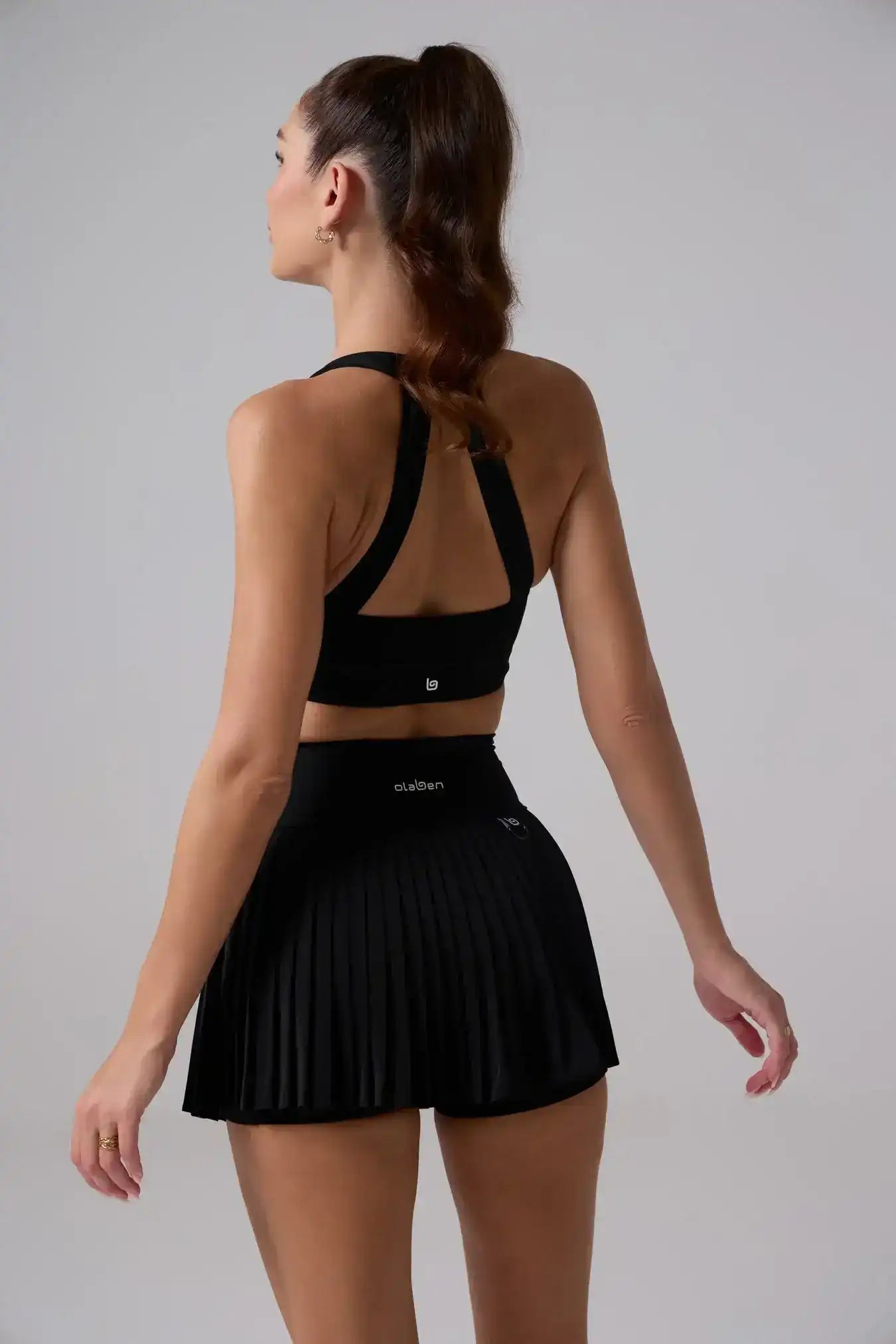 Side view of Olaben Lorelei Bra in Black — sculpted profile, studio shot