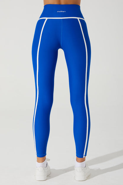 Stylish Atlantis Blue women's leggings with a ludic pattern, perfect for active wear.