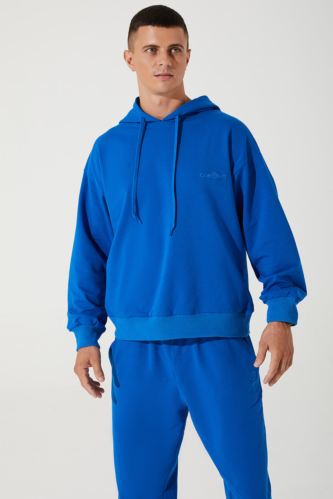Men's hoodie in Atlantis blue, featuring a cropped design - OW-0033-MHO-BL.