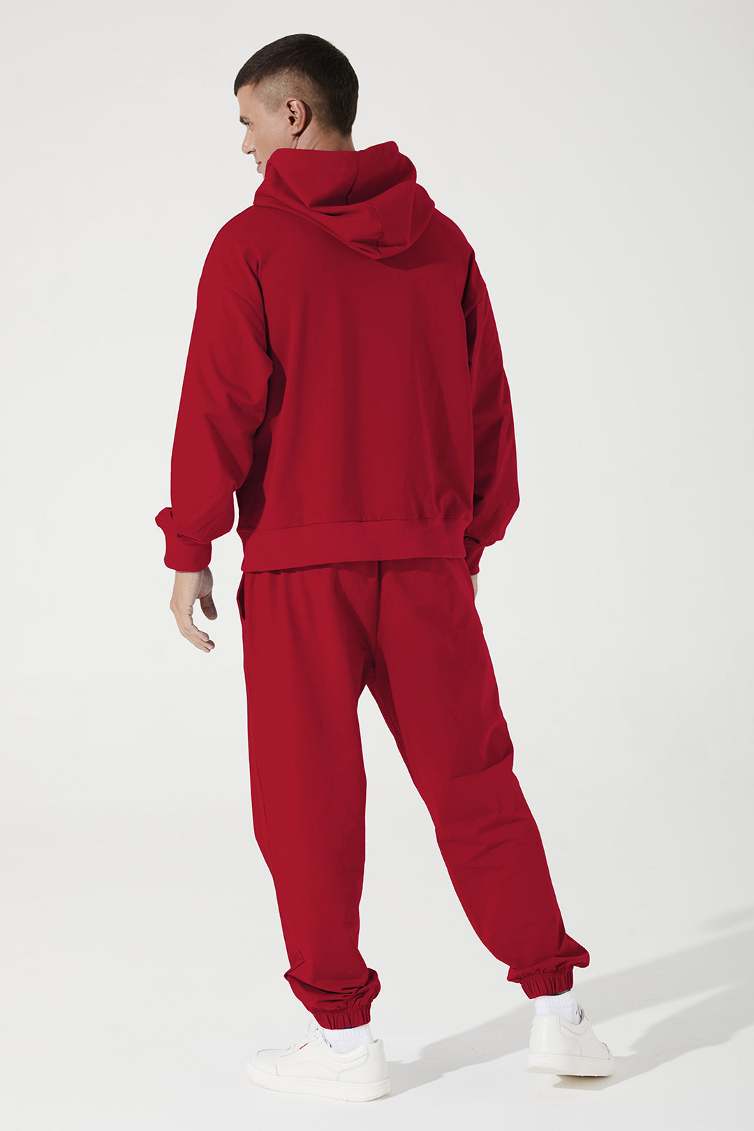 Vibrant magenta red men's hoodie with a cropped style, perfect for a trendy look.