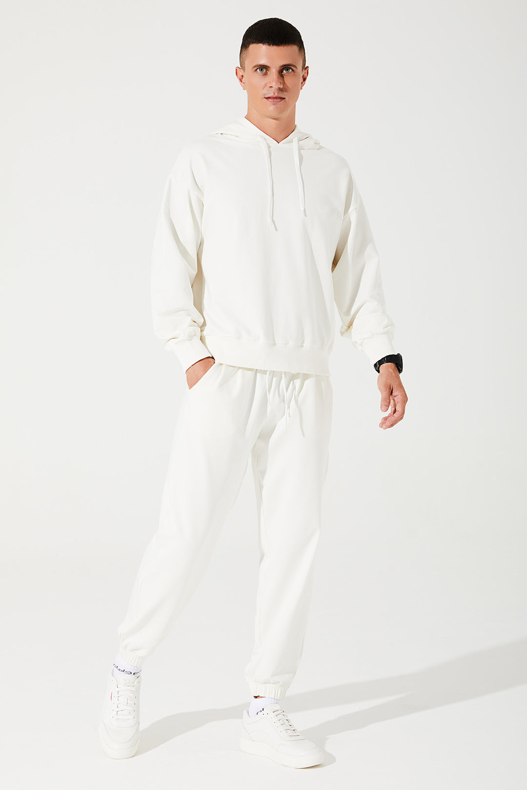 White men's hoodie with cropped top design, perfect for a stylish and casual look.