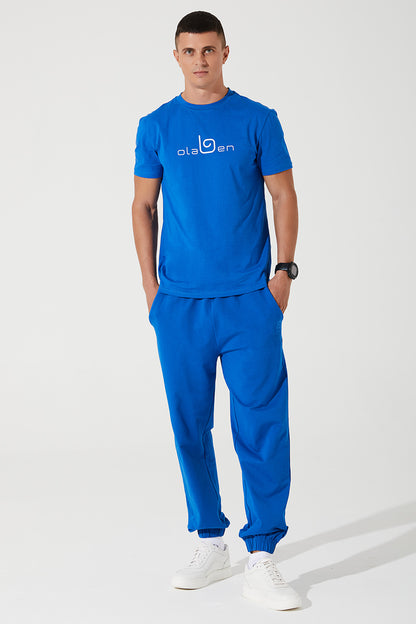 Janet's Atlantis Blue men's sweatpants, a comfortable and stylish choice for casual wear.