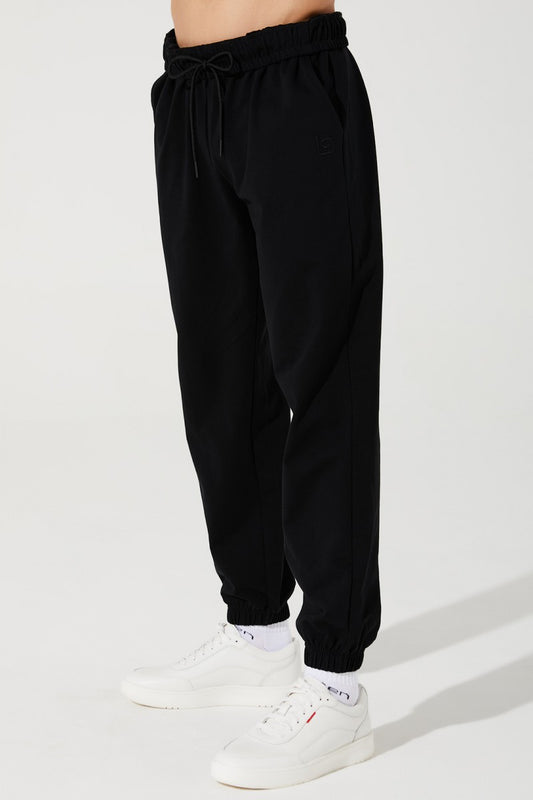 Black men's sweatpants and trousers for Janet, style OW-0034-MTR-BK, in 1.jpg format.