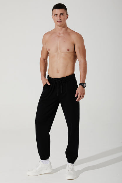 Black men's sweatpants and trousers for Janet, style OW-0034-MTR-BK, in 2nd image.