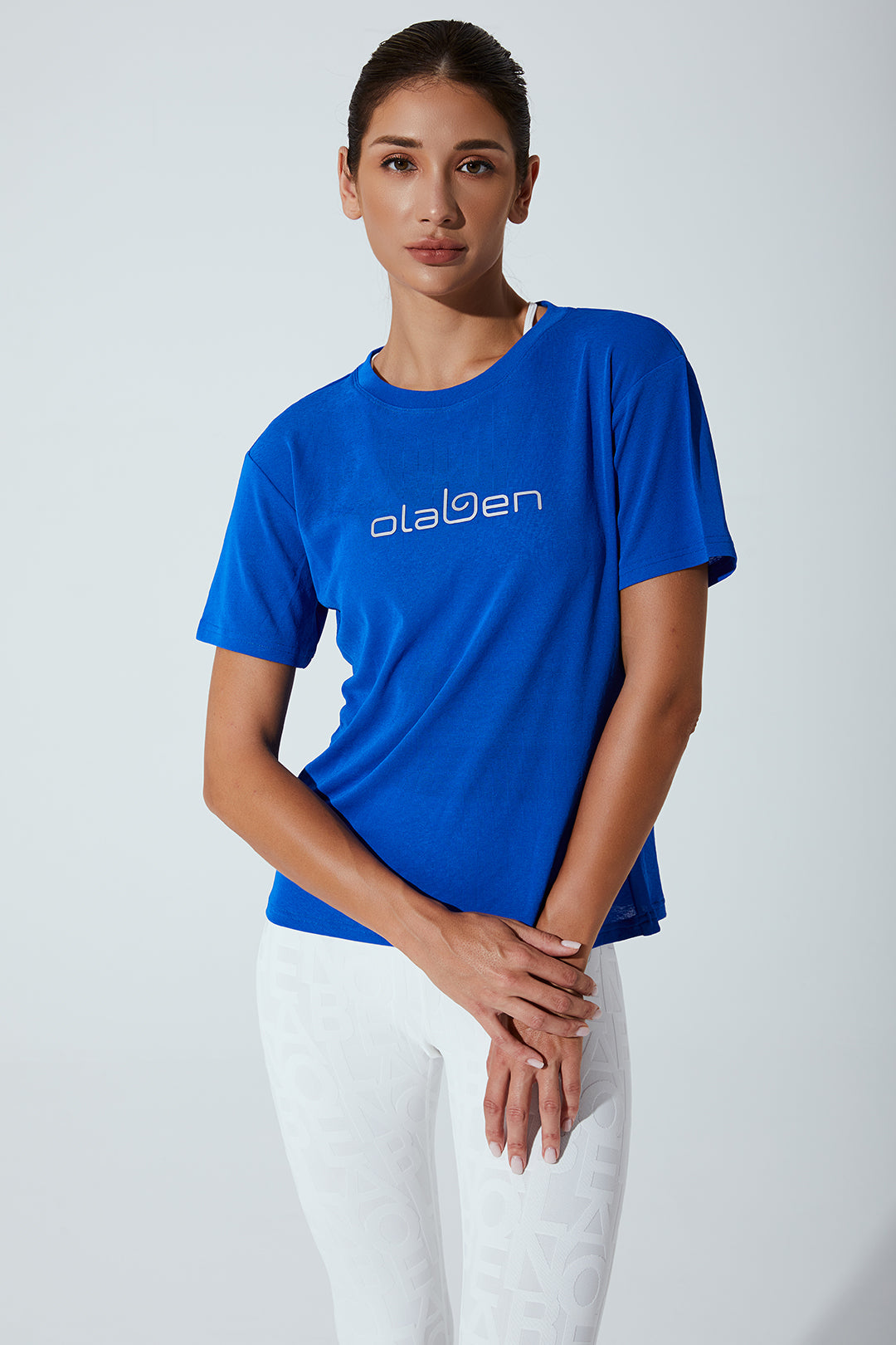 Blue ultramarine women's short sleeve athletic tee with the brand name 'Olaben'