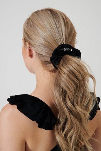 Black scrunchie headwear - a stylish accessory for any outfit. (Image: olaben_scrunchie_headwear_black_black_OW-0161-UHW-BK_3.jpg)