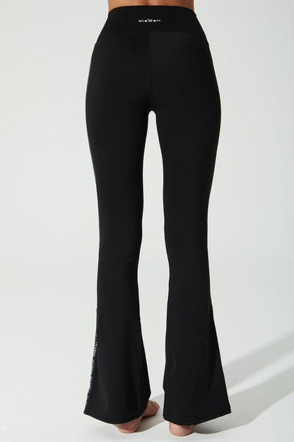 Black women's leggings with OLABEN YLANG logo, perfect for any occasion.