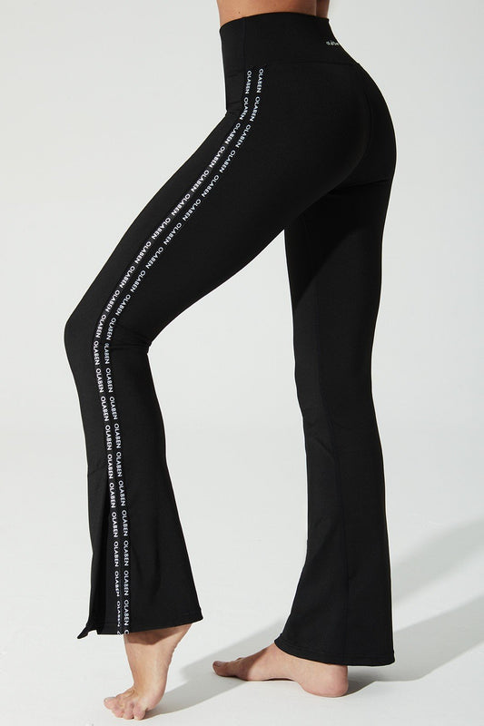 Black women's leggings with OLABEN YLANG logo, perfect for a stylish and comfortable look.