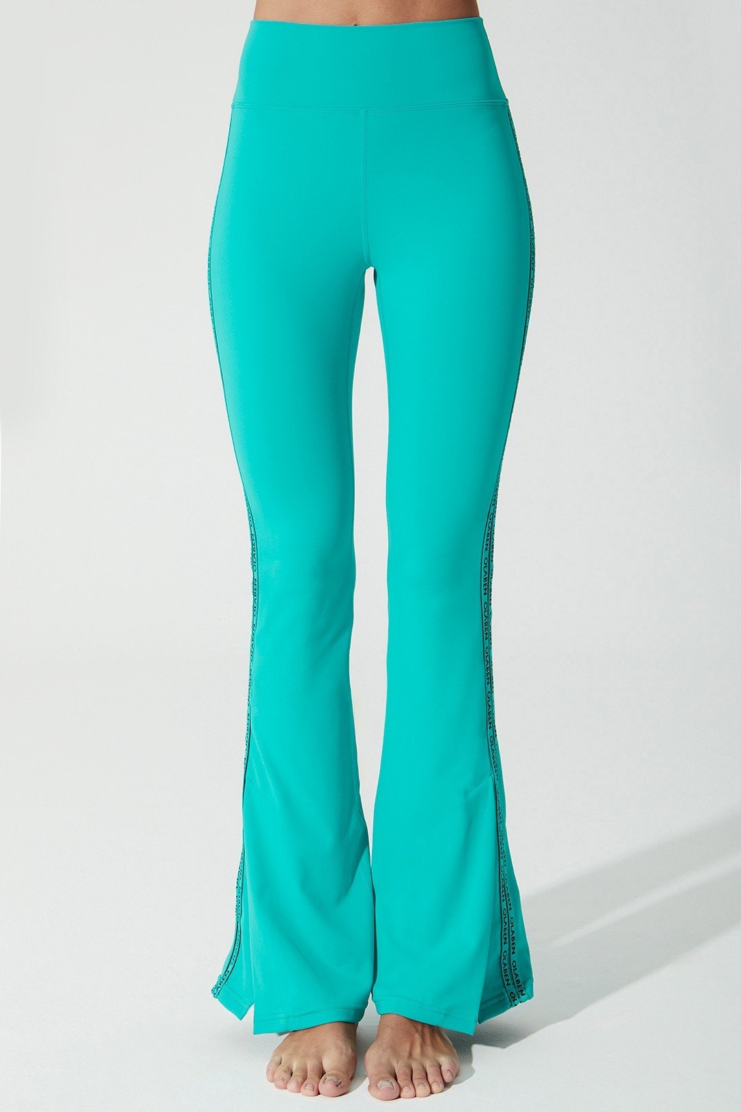 Java green women's leggings with OLABEN YLANG design, perfect for active wear and style.