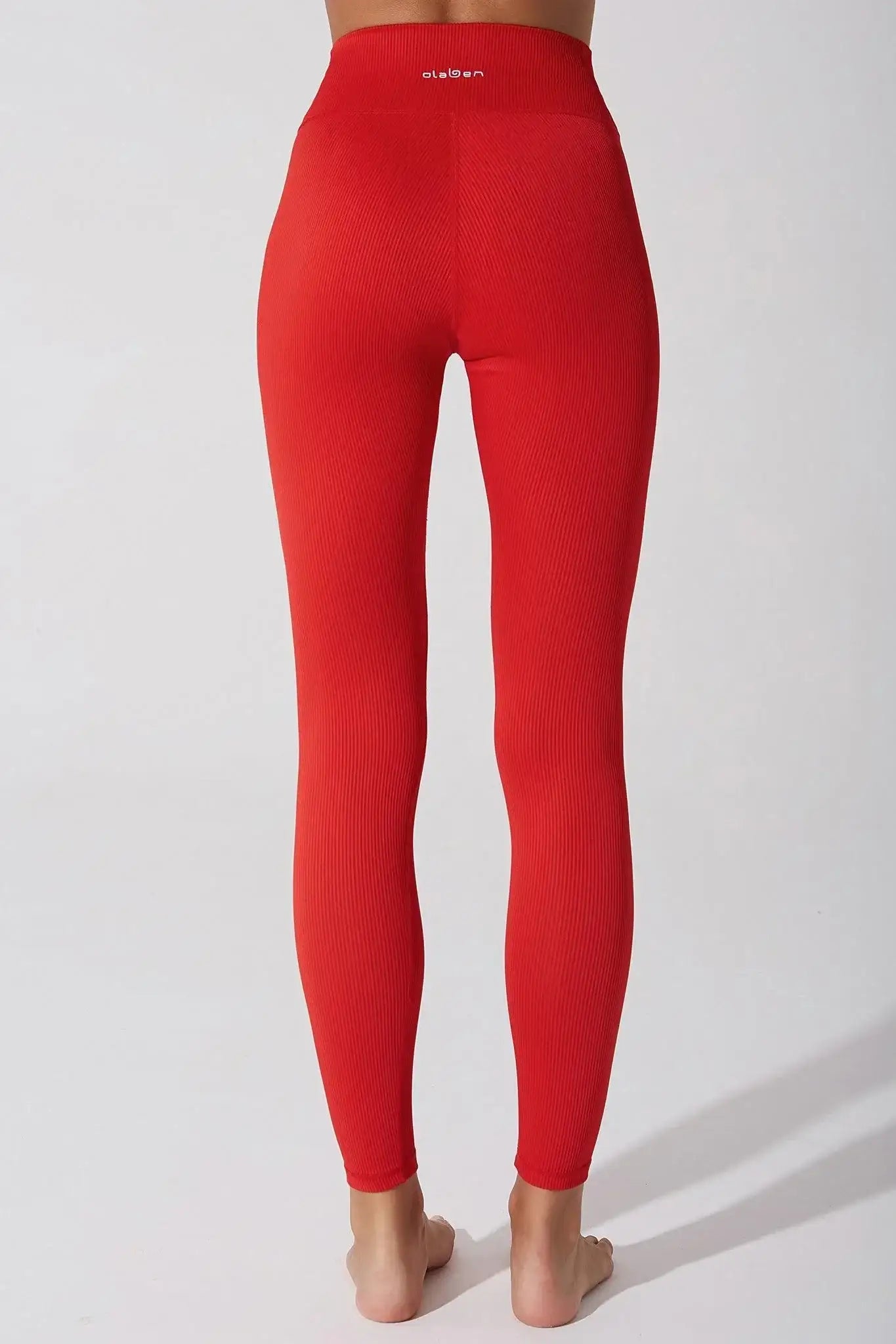 Side view of Olaben Querida High Waist R Legging in Savvy Red — sculpted profile, studio shot