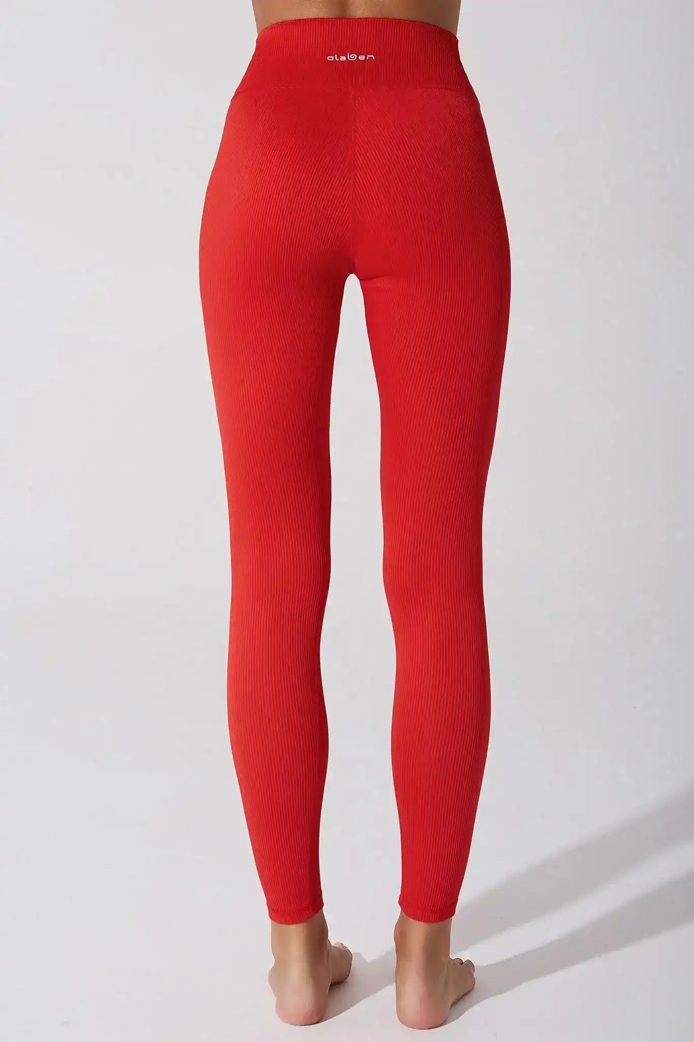 Side view of Olaben Querida High Waist R Legging in Savvy Red — sculpted profile, studio shot