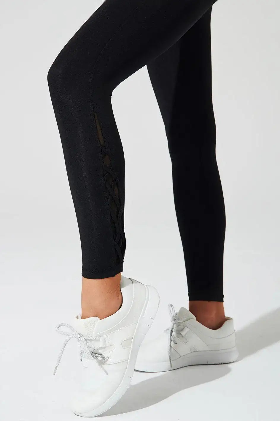 Side view of Olaben S'Angria 7/8 High Waist Legging in Black — sculpted profile, studio shot