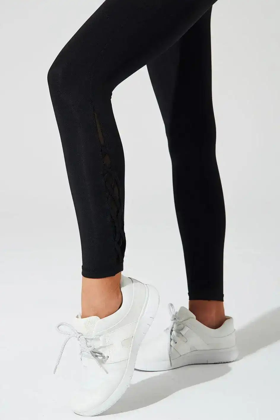 Side view of Olaben S'Angria 7/8 High Waist Legging in Black — sculpted profile, studio shot