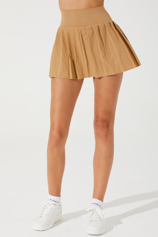 Serena women's tennis skirt in cappuccino beige, perfect for a stylish and comfortable game.