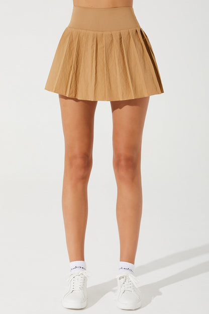 Serena women's tennis skirt in cappuccino beige, perfect for a stylish and comfortable game.