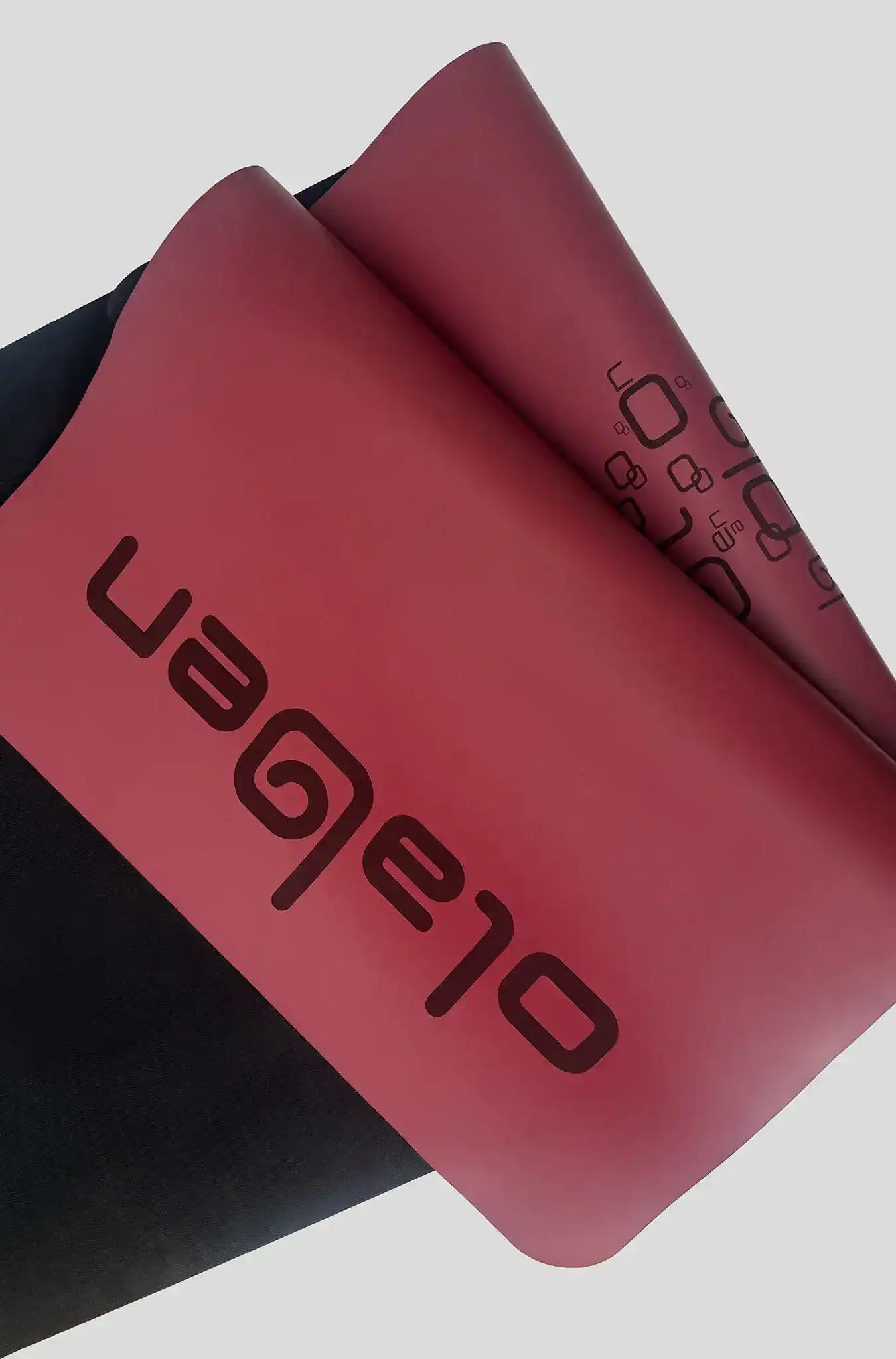 Olaben branded yoga mat in dusty rose with black logo, ideal for fitness and yoga sessions