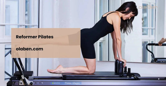 Woman practicing Reformer Pilates on Pilates Allegro machine in bright fitness studio