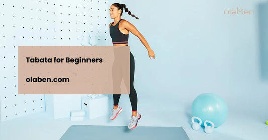 Woman in activewear doing Tabata workout in home gym with kettlebell and exercise ball