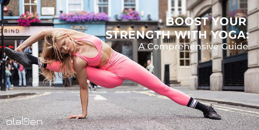Woman in pink activewear doing advanced yoga pose outdoors on a city street, fitness focus