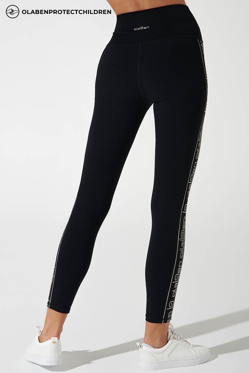 Black high-waist double knot leggings for women, stylish and comfortable workout attire.