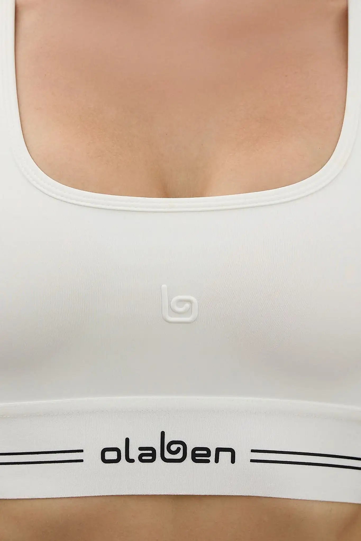 White Olaben activewear sports bra with logo detail for yoga and fitness