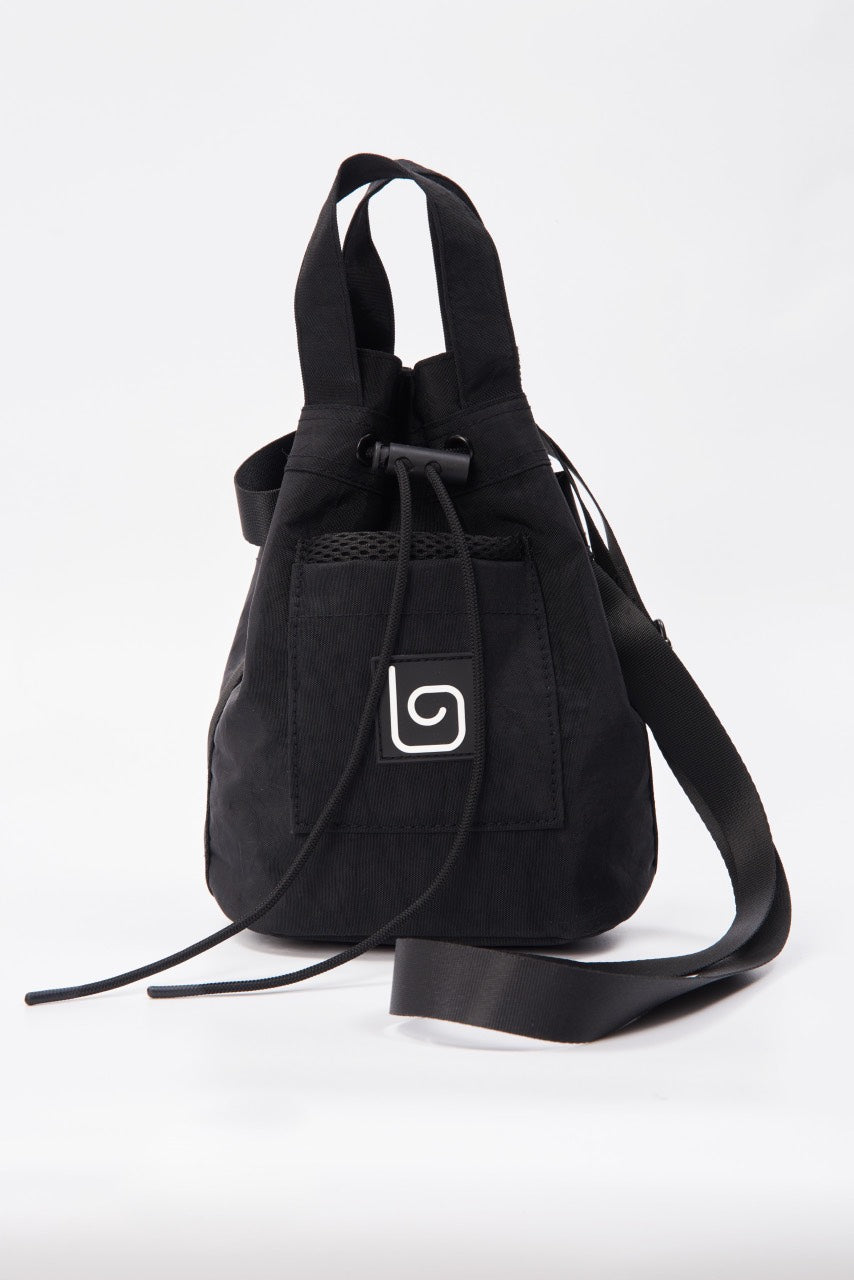 Black bucket bag with OW-0146-UBA-BK design, perfect for a stylish and versatile look.
