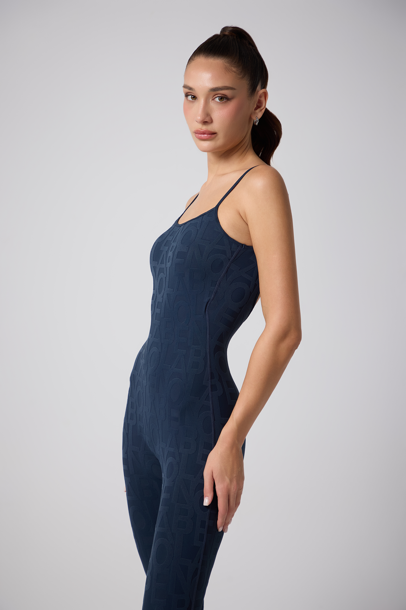 Olaben Coeur Del 3D jumpsuit in deep navy, embossed sculpting fabric