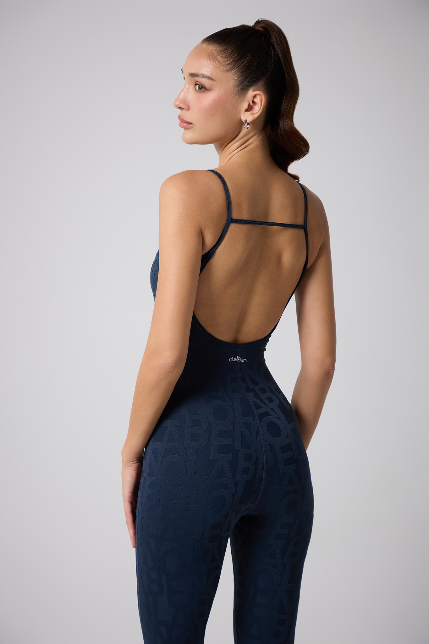 Olaben Coeur Del 3D jumpsuit in deep navy, embossed sculpting fabric